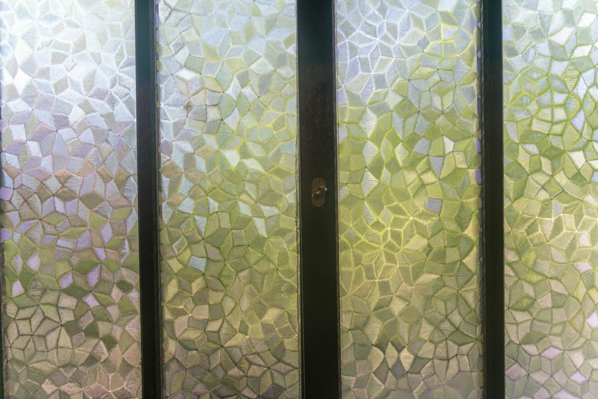 Pros & Cons of Glass Finishes: Clear, Acid-Etch, Frosted, Textured 2 - Angelo and Sons textured glass finish on a door